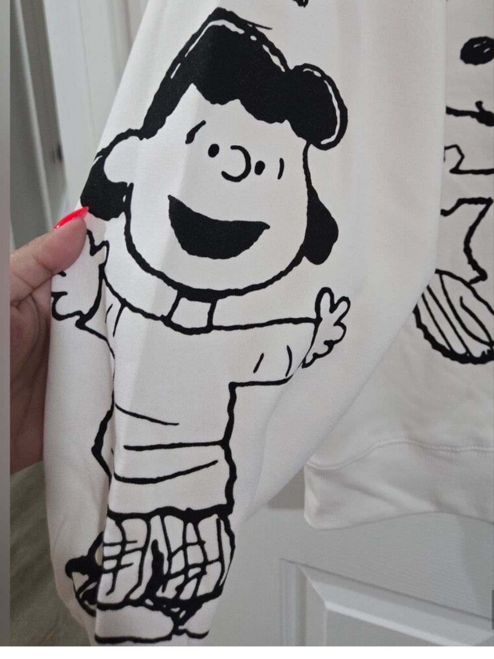 Peanuts Cream Off-Shoulder Snoopy & Friends Graphic Sweater - Picture 3 of 5